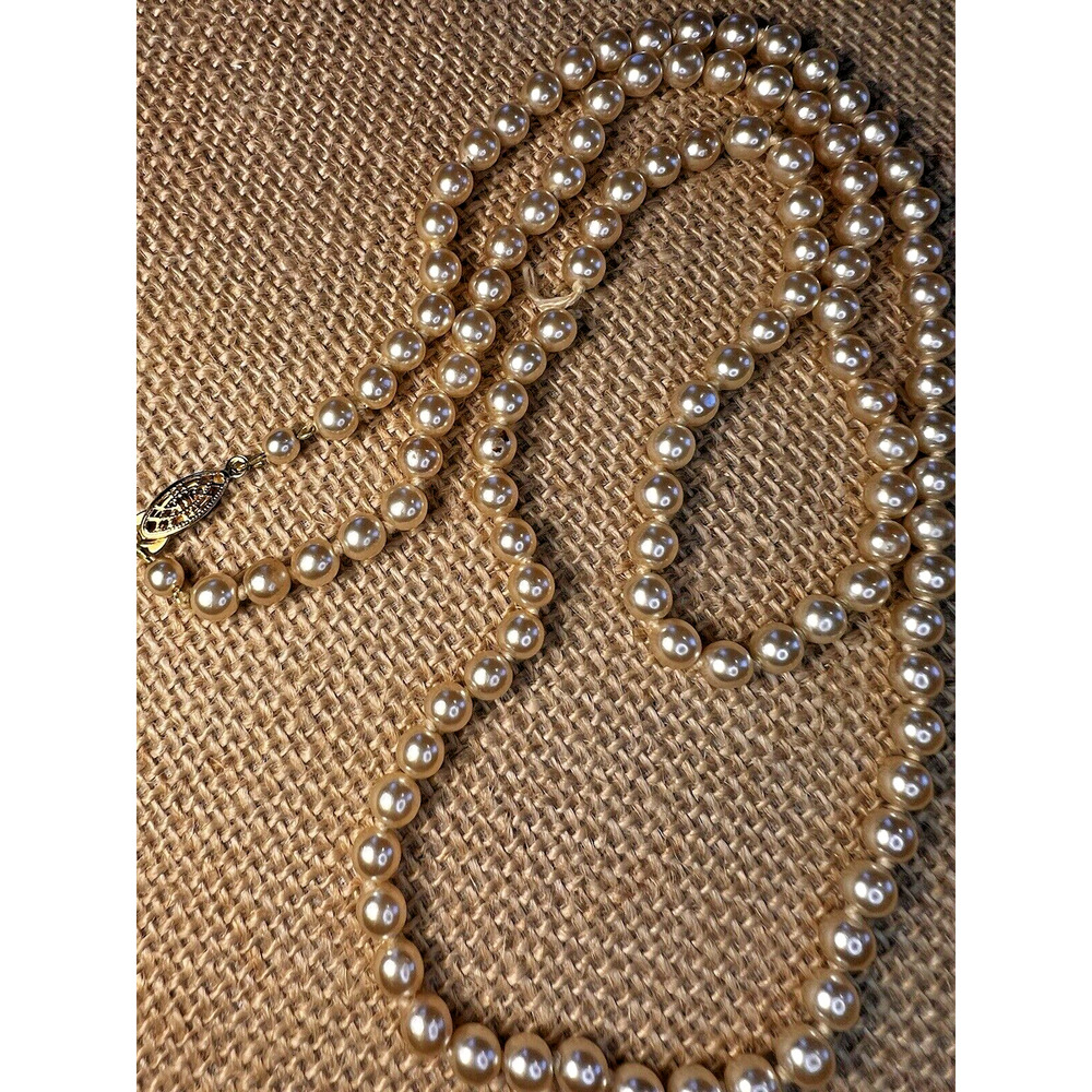 Strand (Broken) of Knotted Faux White Pearls with Gold tone Clasp--28 inches